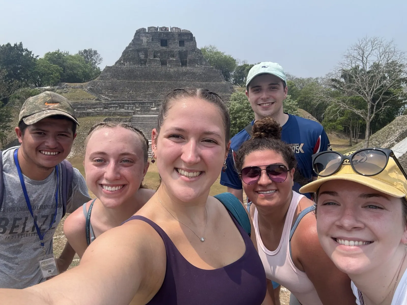 Faculty-led student group visiting a Maya site in Belize