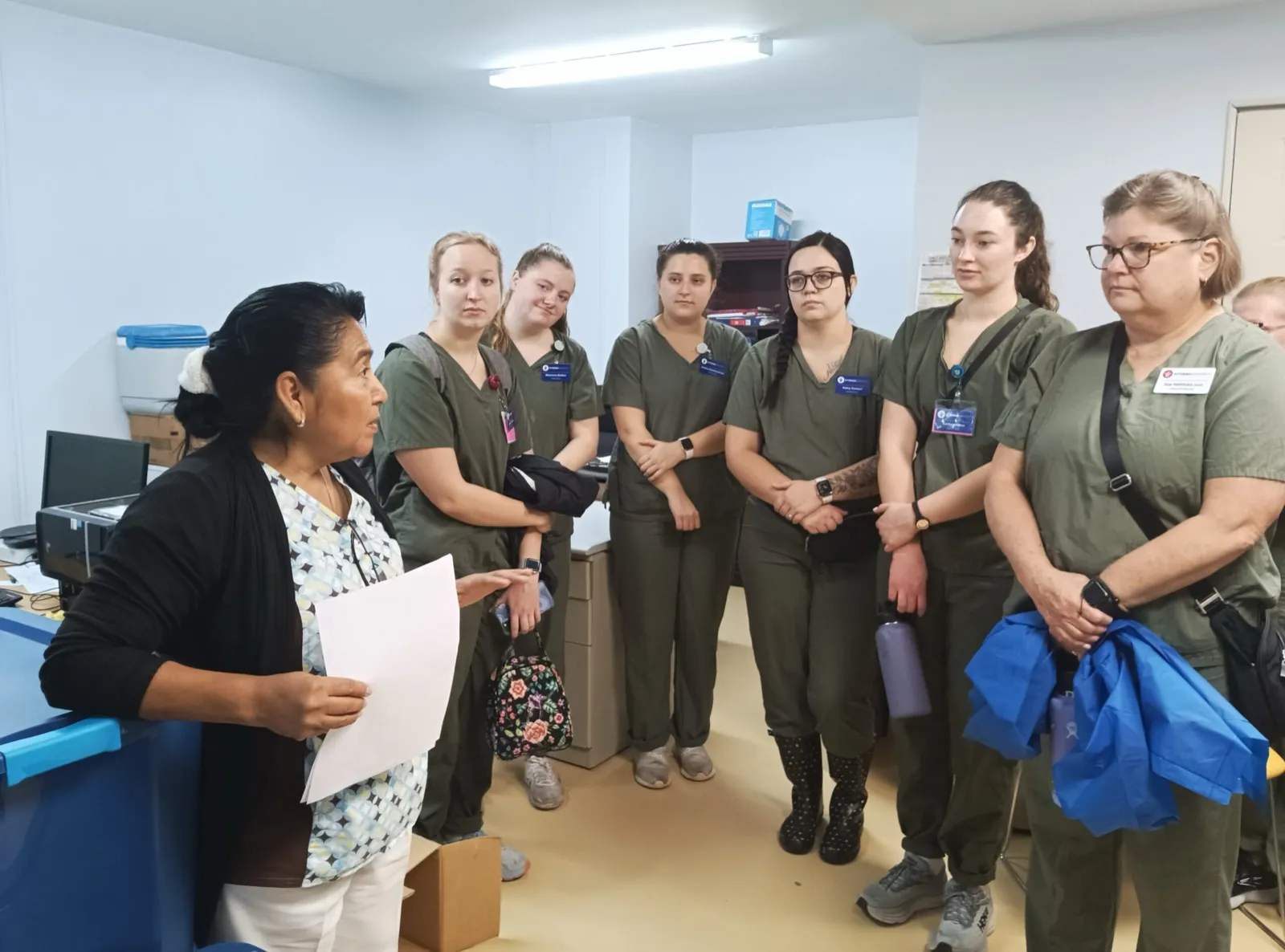 Faculty-led nursing group with local clinic staff in Belize
